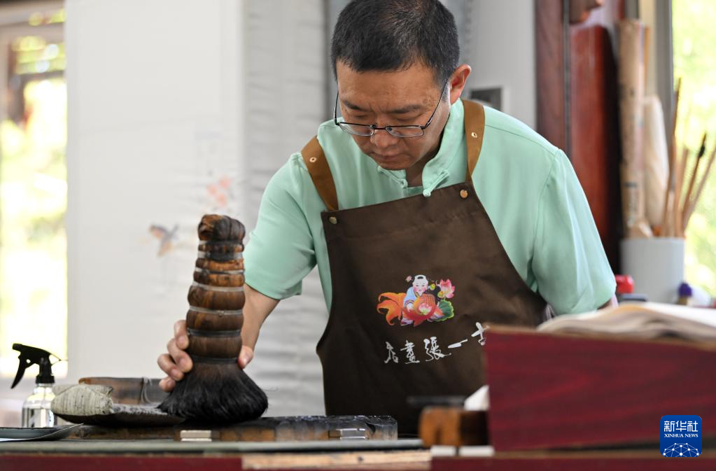 心怀老习俗——传年画的世家