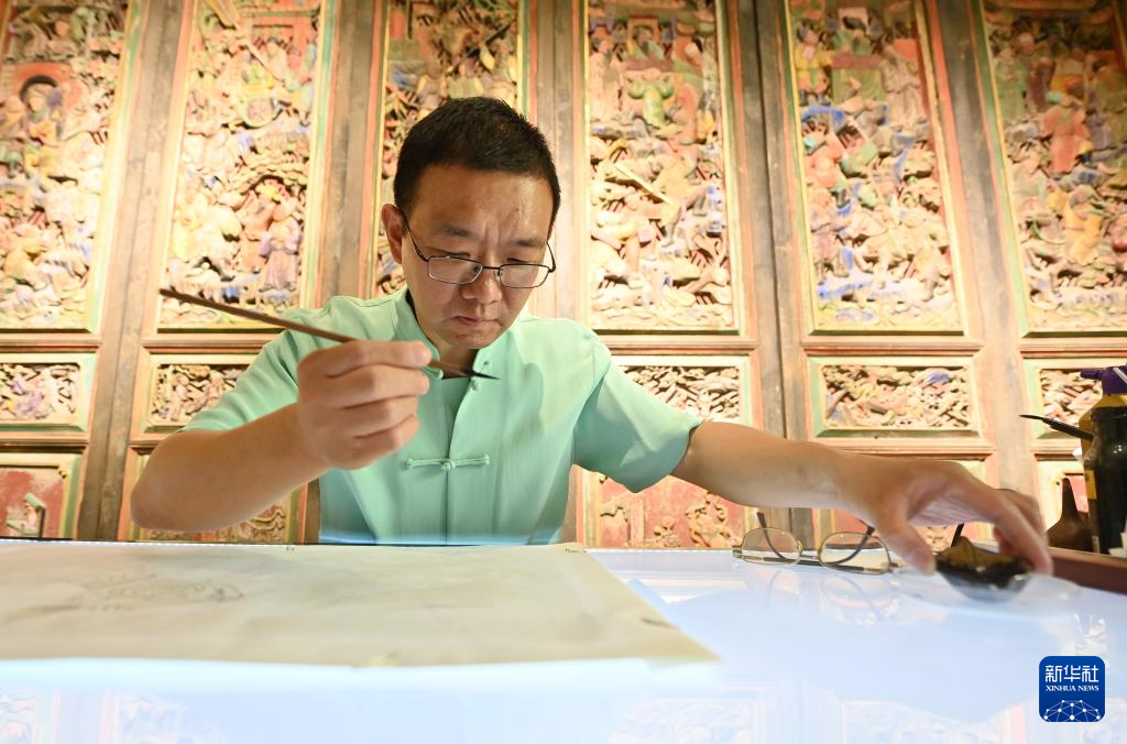 心怀老习俗——传年画的世家