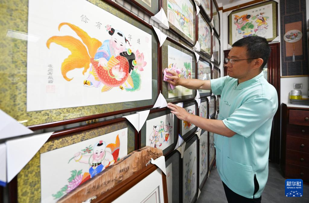 心怀老习俗——传年画的世家